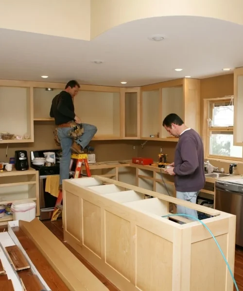 kitchen+remodeling+contractors+at+work+installing+new+kitchen+cabinets-1920w