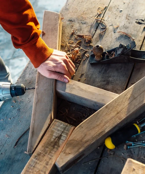 worker-drills-a-hole-in-the-bar-with-a-screwdriver-2026-01-07-06-33-59-utc